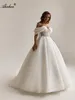 Chic en mousseline de mousseline hors des manches d'épaule robe de mariée en ligne A-line