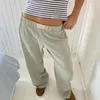 Pantalon féminin pantalon sets femmes décontractées longues élastiques pantalons moyens de taille moyenne de couleur unie de couleur large ajustement lâche avec poches streetwear