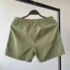 Short shorts verão running homens casuais academia preta fitness confortável cintura de cordão sólida bolsos múltiplos H240506