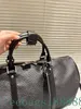 Classic 50cm Presbyterian duffel bag Men's Designer bag 50CM crossbody bag Men's leather plain embossed logo travel bag handbag