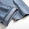Herren Jeans Männer Jeans Europäische und amerikanische trendige männliche Denim Pfannen Traight -Bettler getragene Löcher nostalgische Strt Persönlichkeit Hosen Y240507
