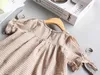 Vestidos femininos xadrez xadrez de garotas de verão nova lazer solta Blusa de baby body cuff-up camisa infantil roupas 1-5y lt020 h240507