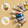 Tazas de platos Utensilios Nuevo diseño Alimento de alimentos para bebés Cuchara de comida sólida y horquilla sin bisfenol Un mango de silicona Cartoon Bear acero inoxidable Utensil para niños TA