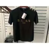 Summer New Mens Tee Designer Womens Short Sleeved Shoulder Gold Button Hot Stamped Cotton T-shirt For Couples