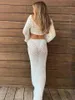 Robes décontractées de base 2024 Femmes sexy y2k Hollow Out MAXI Jupe Set Crochet Long Slve Tie Up Crop Top BodyCon Tricoted Long Jupe 2 Pieces Costumes Solid T240505