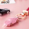 Jobon Hot Selling Style Fashion Metal Car Keychain coloré avec LED Light Light Zinc Alloy Electroplate avec boîte-cadeau