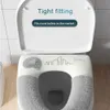 Toilettensitz Deckt über universelle weiche Toilettensitzabdeckungsmatte mit Toiletten Deckel Lifter Dicker wärmer waschbarer Toilettenlid -Deckel Badezimmerzubehör Accessoires