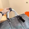 Super coole obere schwarze geprägte Design -Reisetasche Nylon Handtasche große Kapazität Duffel Bag Carry Gepäck hochwertige Leder Luxus -Männer -Tasche 50 cm