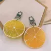 Keychains Lanyards Neue große Zitronenscheibenschlüsselketten -Männer und Frauen Paar Schlüsselkettenbeutel Anhänger Großhandel Großhandel