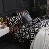 Bedding sets Luxury black bedding large single full-size polyester bedding linen down duvet cover set with modern bird plain weave anime pillowcases J240507