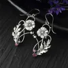 Dangle Chandelier Retro Silver Flower Earrings instnic Metal Round Growd Plants Proforts Plants اطلب من أقراط الخطاف الحجرية XW