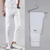 Men's Jeans White black classic elastic tight fitting jeans high-quality mens slim fit jeans denim casual pants mens cotton elastic pencil pantsL2405