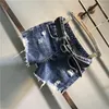 Frauen Jeans Europäische Kausal-Denim-Shorts für Frauen 2024 Spring Streetwear Student Mid-T-T-T-T-T-T-T-Taziist Raked Evertile Slim Jean Hosen gerissen