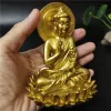 Sculture statue del Buddha dora