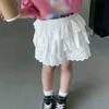 Robe tutu coréenne Joupes de filles décontractées en été jupe de gâteau de couleur solide pour fille sweet tutu robe adaptation des vêtements pour enfants doux 1-6y d240507
