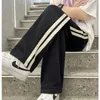 Męskie spodnie Summer cienkie sportowe męskie męże luźne proste spodnie koreańskie patchwork boczny pasek Sekcja Drape szerokie nogi H240506
