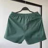 Short shorts verão running homens casuais academia preta fitness confortável cintura de cordão sólida bolsos múltiplos H240506