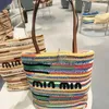 2024 Sommer vielseitiger Streifen Stroh gewebter Tasche eine Schulterhandtasche Einkaufstaschen große Kapazität Tasche Mama Bag Trend