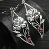 Dangle Chandelier Retro Silver Flower Earrings instnic Metal Round Growd Plants Proforts Plants اطلب من أقراط الخطاف الحجرية XW