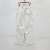 Jeans féminins 2024 Vêtements de printemps Fashion Blanc Denim Grande Couleur de poche pantalon peint à la main.