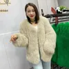Vestes pour femmes manteau de fourrure double épaissis réel du tempérament de la mode V-col