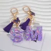 Клавные шнурки A-Z Shiny Sequin Letter Letter Pare Pare Purple Purple Stars заполненные подвесные подвесные клавиши сумочка автомобиль ключ аксессуары очарования очарования