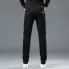 Four saisons noires jeans pour hommes automne et hiver slim slim fit high gound élastique pantalon long pantalon