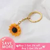 Keychains Lanyards FNIXTAR 10PCS/Lot Sunflower Key Chain Mirror Gepolijste roestvrijstalen sleutelhangers voor doe -het -zelf maken Keychain Mens Fashion Jewelry