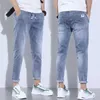 Mäns jeans 2023 Nya sommaren Slim Korean Street Luxury Work Pants Mens elastiska midja jogging jeans arbetskläder denim jeansl2405