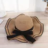 Chapeaux à bord large chapeau seau d'été femme aviron de plage de plage large edge femme décontractée panama chatte classique arc plat str du chapeau soleil féminin fedora cadeau j240425