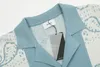 RH Designer Rhude Wysokiej jakości bawełniany krótki rękaw T-koszulka odporna na zmarszczki Spersonalizowana drukowana designerska koszulka w połączeniu z modnymi szortami