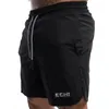 Shorts pour hommes Echt et tissu nylon féminin à cinq points de sport en vrac sèche rapide en dentelle solide même style été