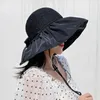 Bérets Femmes Hat à UV Protection solaire élégante pour un large bord de bordur large avec une sangle fixe pliable voyage respirant