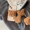 Les supports de monture de téléphone portable Korea 3d mignon ours en peluche chaude pour le magne de téléphone magnétique Gript Grip Tok pour l'iPhone Stronteur de charge de charge sans fil Bague de support