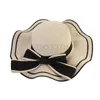 Chapeaux à bord large chapeau seau d'été femme aviron de plage de plage large edge femme décontractée panama chatte classique arc plat str du chapeau soleil féminin fedora cadeau j240425