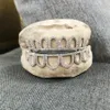 Denti hip hop griglie inferiori top bottoni dentali denti punk tappi per rapper cosplay gioielli inviati un modello di denti 240418
