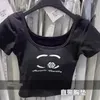 Neues Design Frauen-Logo Blumendruck kurzarm gepolsterter Baumwoll-T-Shirts Crop Tops