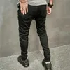 Herren Jeans Männer stilvolle Hip -Hop -Stickereien Skinny Jeanshose Männlicher Strt -Stil Slim Jogging Denim Pants Y240507