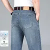 Heren jeans 2024 zomer dunne lyocell jeans heren ijs zijden drape zakelijke casual elastische denim broek los rechte broek merk kleding y240507