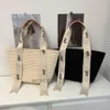Designerskie torby słomkowe koszyk kobiety torebka wiadra torebka plażowa na ramię crossbody crossbody torebki projektanci torebki drzewne torebka