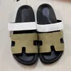 2024 Sandales féminines Slippers Fashion Luxurys Floral Slipper Le cuir en cuir Flats Sandales Summer Beach Choas Loafers Gear Bottoms Sliders