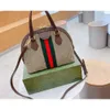 الجملة الجديدة شل Baojia Retro Fashion Handbag Counter Counter Bag