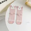 Chaussettes de femmes Softs Soft's Brepinable Japanese Cotton Middle Tube Tube Flower Cartoon Party