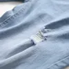 Jeans masculin jeans jeans trou de denim en ruine tendance élastique pantalon décontracté de haute qualité pantalon de grande taille J240507