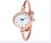 Regarder Man Femme Blanc Yellow Brown Black Bracelet Wrist Wrists Montre à bracele