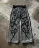 Pantalon européen et américain à la mode haute à taille haute le bord brut jean lavé Men Street pantalon large surdimensionné surdimensionné 240506