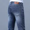 メンズのためのプリントダイヤモンドジーンズ夏の薄い弾性ファッショントレンディなスリムフィットレジャーラグジュアリーヨーロッパ製品ロングパンツ男性