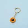 Keychains Lanyards FNIXTAR 10PCS/Lot Sunflower Key Chain Mirror Gepolijste roestvrijstalen sleutelhangers voor doe -het -zelf maken Keychain Mens Fashion Jewelry