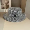 Chapeau de seau de luxe mille grille de motif d'oiseau chapeau de créateur de créateurs