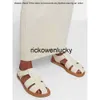 Die Reihe der * Reihen neue echte Leder gewebte Sandalen Frauen Freizeit Mode vielseitig Baotou flache Caligae Schuhe